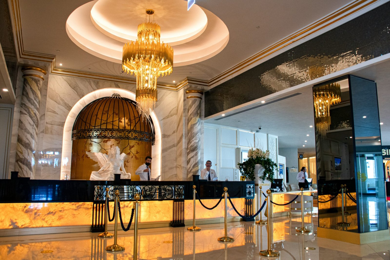 gold chandelier on white ceiling